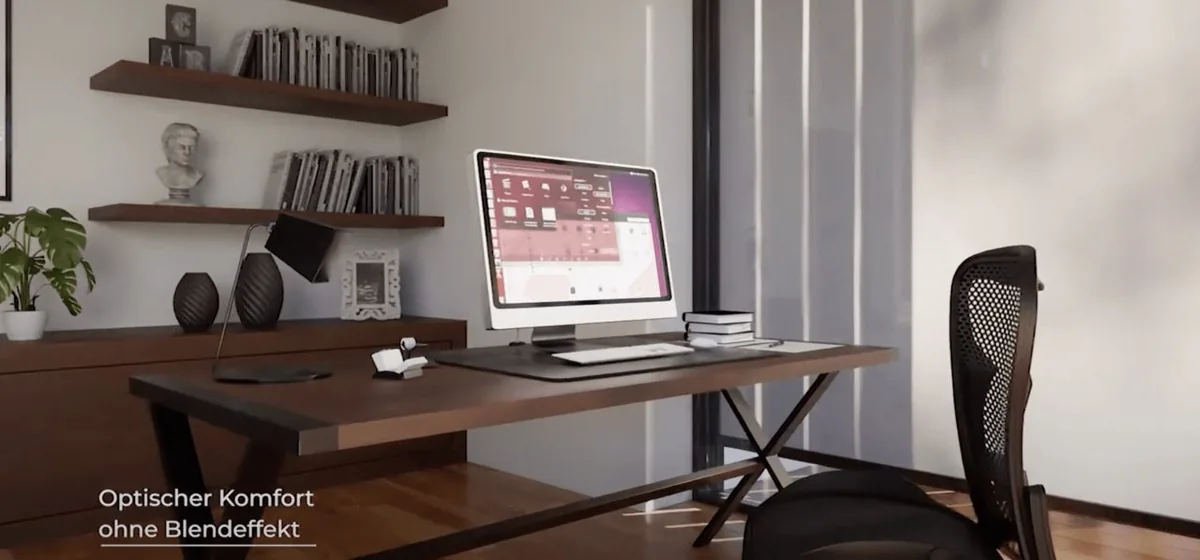 Modernes Büro mit Computer und optischem Komfort dank NORTA Screens ohne Blendeffekt. Funktionale und stilvolle Raumgestaltung.